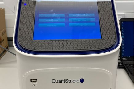 Photograph of qPCR machine in lab