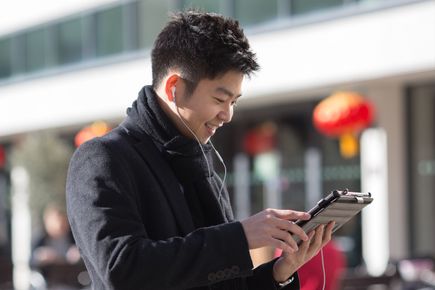 Person looking at a tablet