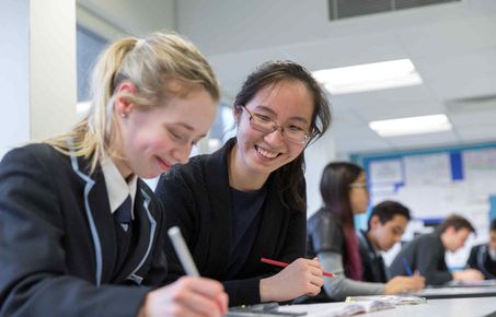 An Imperial student mentors a school pupil.