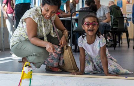 Parent and child doing a science activity