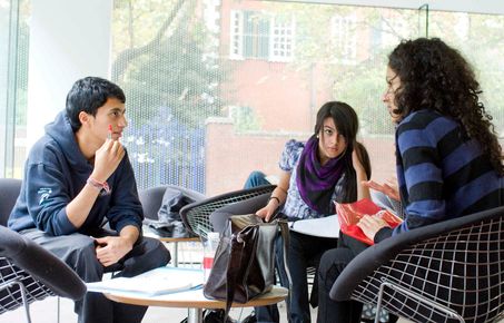 Students chatting around a table