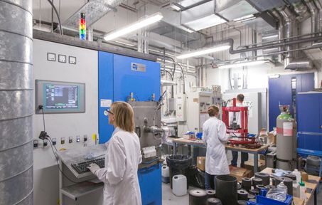 An image of two people researching in the Centre for Nuclear Engineering lab