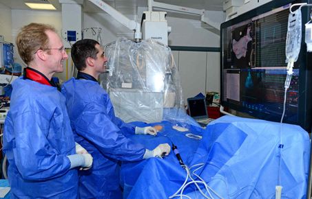 Two doctors in operating theatre