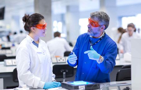 Student and tutor in lab