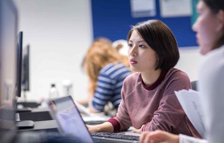 Student working at a computer