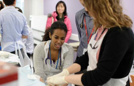 Undergraduate students in a clinical skills lab