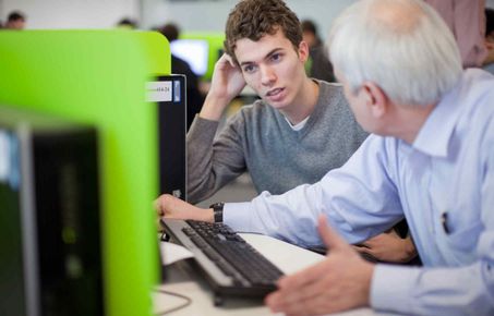 Student in discussion with tutor