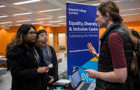 women smiling at each other at EDI event