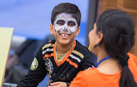 Child with face painted