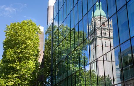 Queens Tower reflected in Sherfield Building