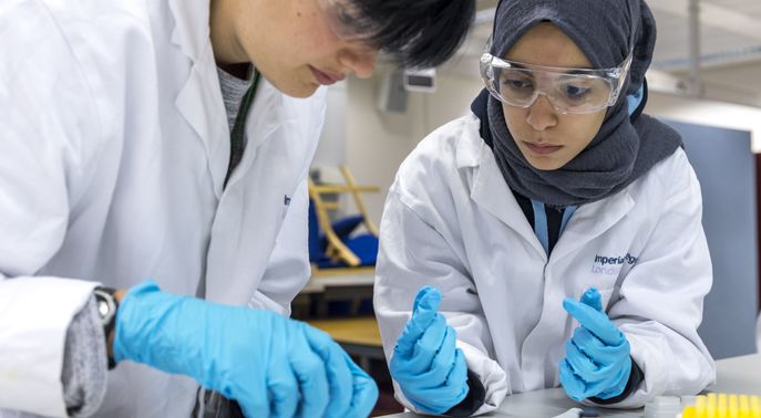 An image of two students in the lab