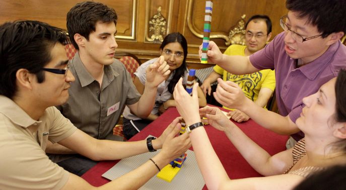 PhD students in a group training session