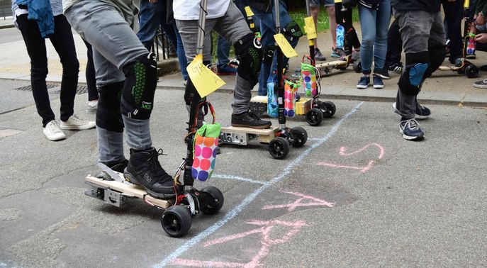 Electric scooters race at the start