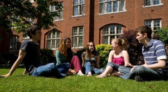 Student sitting outside acommodation T4