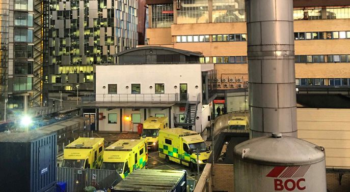 Ambulances outside a hospital building