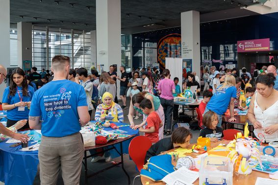 UK DRI researchers gathered around stall at Exhibition Road Festival