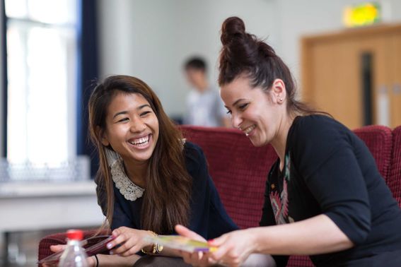 Two people laughing