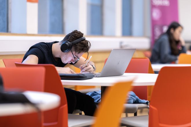 A student revising in a study space