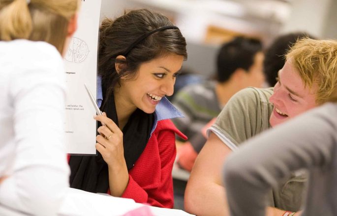 Students working together in class