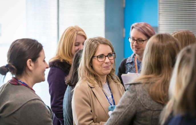 Smiling attendees at an event