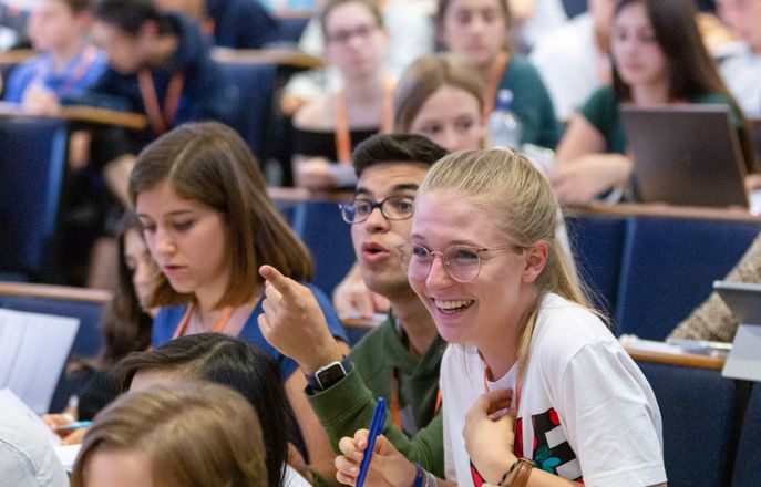 Students studying in a lecture theatre