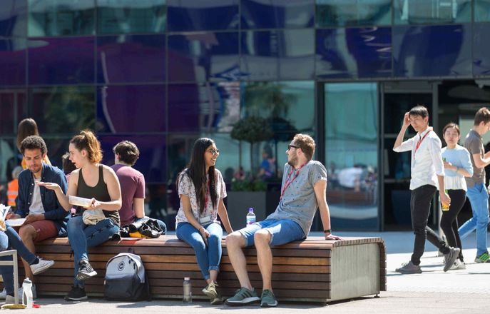 Group of students sat outside