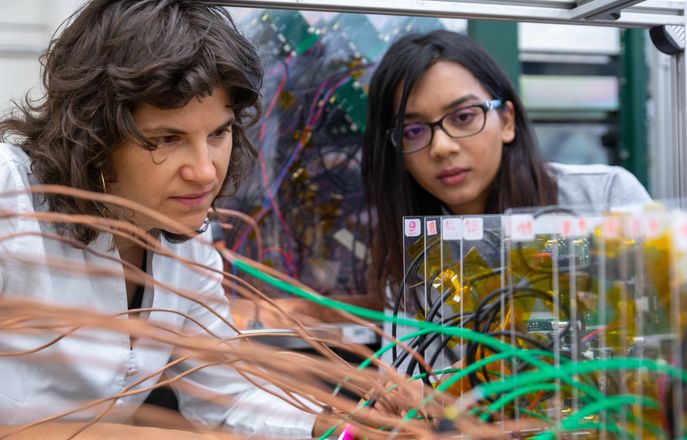 two women working in labs