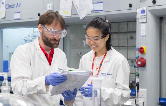 Students in lab smiling