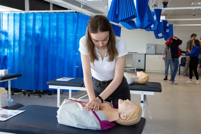 Medical student practises CPR on a dummy
