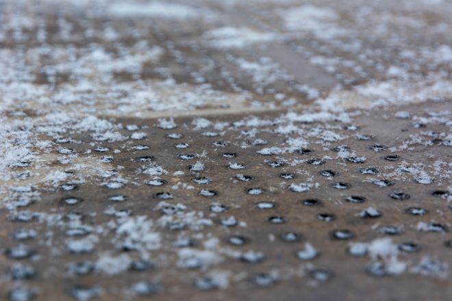 Snow covering the surface of the next-generation permeable concrete pavement (Kiacrete)