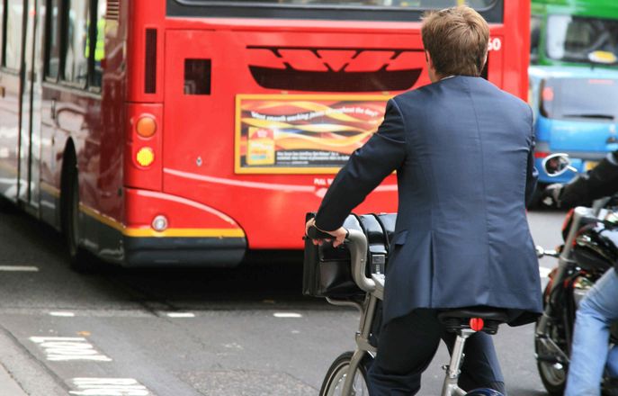 A commuter on a bike in London