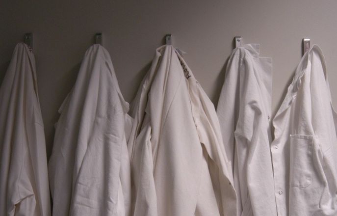 5 hanging lab coats