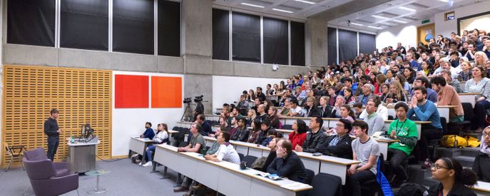 people sitting in a lecture hall