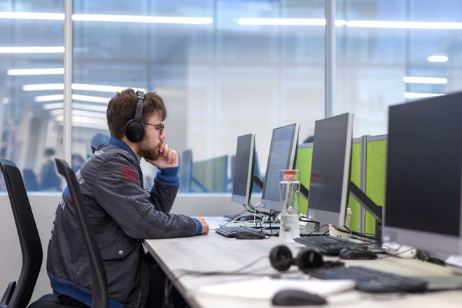 A student sitting at a PC