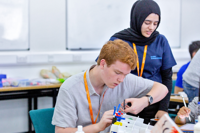 GSS engineering students building robot