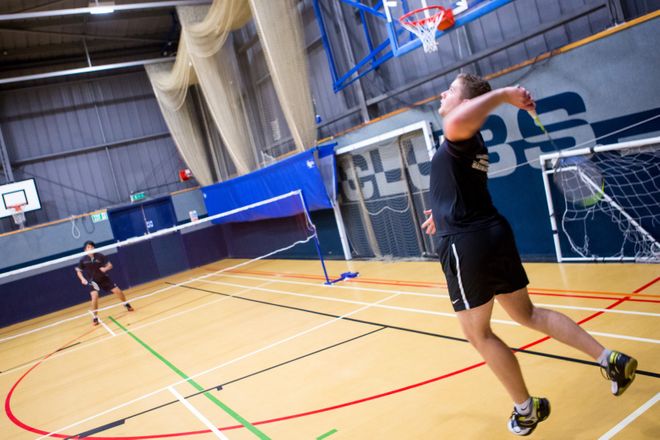 Students playing badminton in Ethos Sports Hall