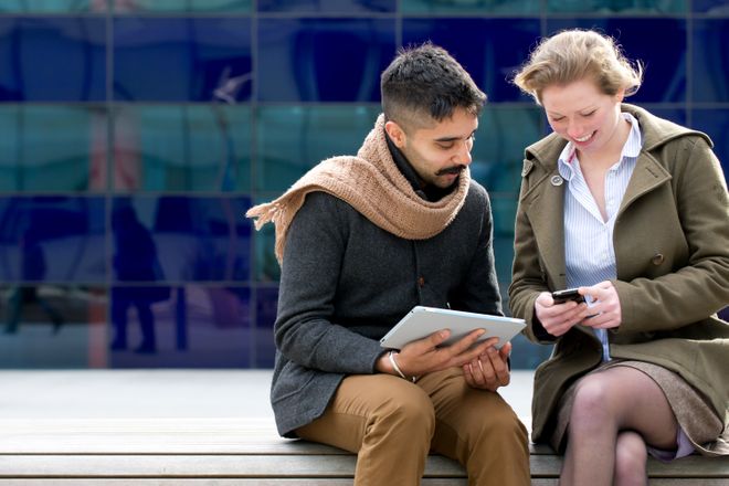 A picture of students using mobile devices