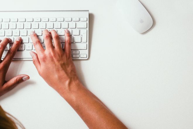 Person typing on a computer for a competition