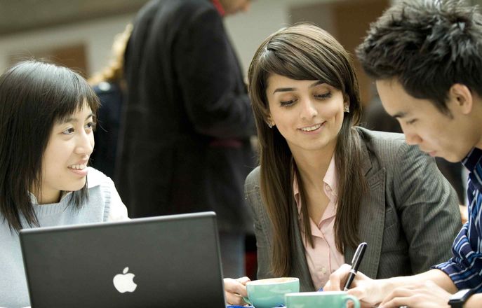 Business School students working