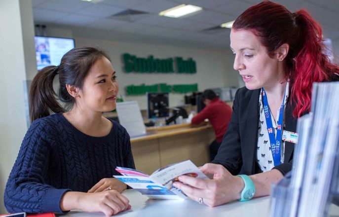 Student getting advice at the Student Hub