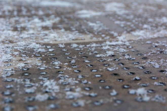 Snow covering the surface of the next-generation permeable concrete pavement (Kiacrete)