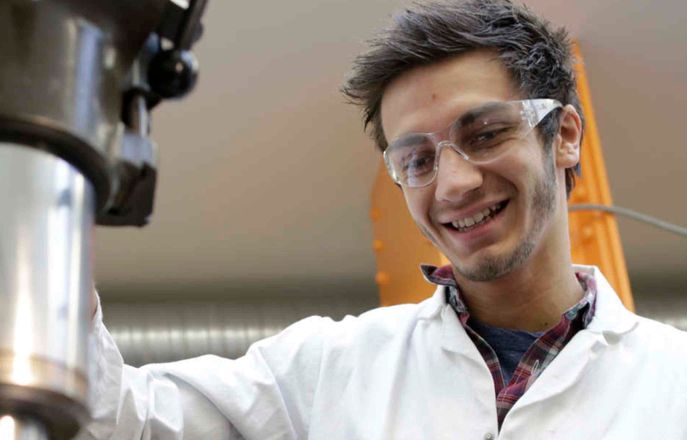 An apprentice in a laboratory