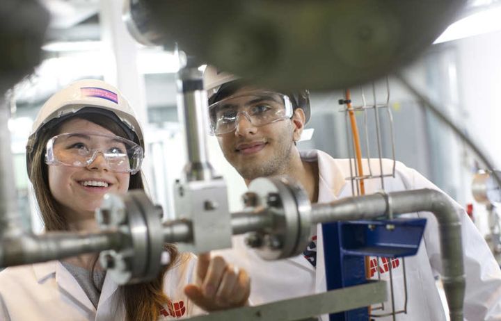 Two researchers working in the Carbon Capture Plant