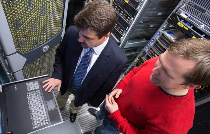 Imperial staff examining a server room