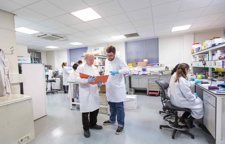 Image of a research team working in a lab