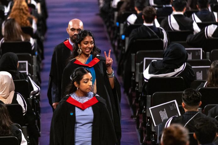 Graduands in gowns at Medicine graduation