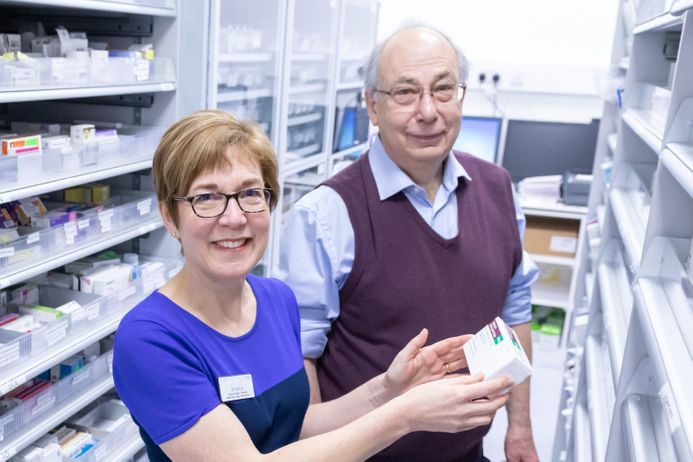 Health researchers in a pharmacy dispensary