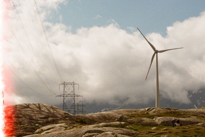 Windmills in a field on a film slide