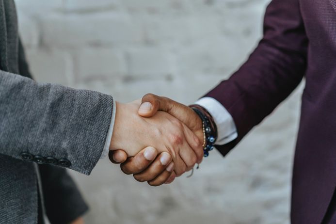 Two people shaking hands