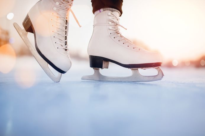 close up of figure ice skates